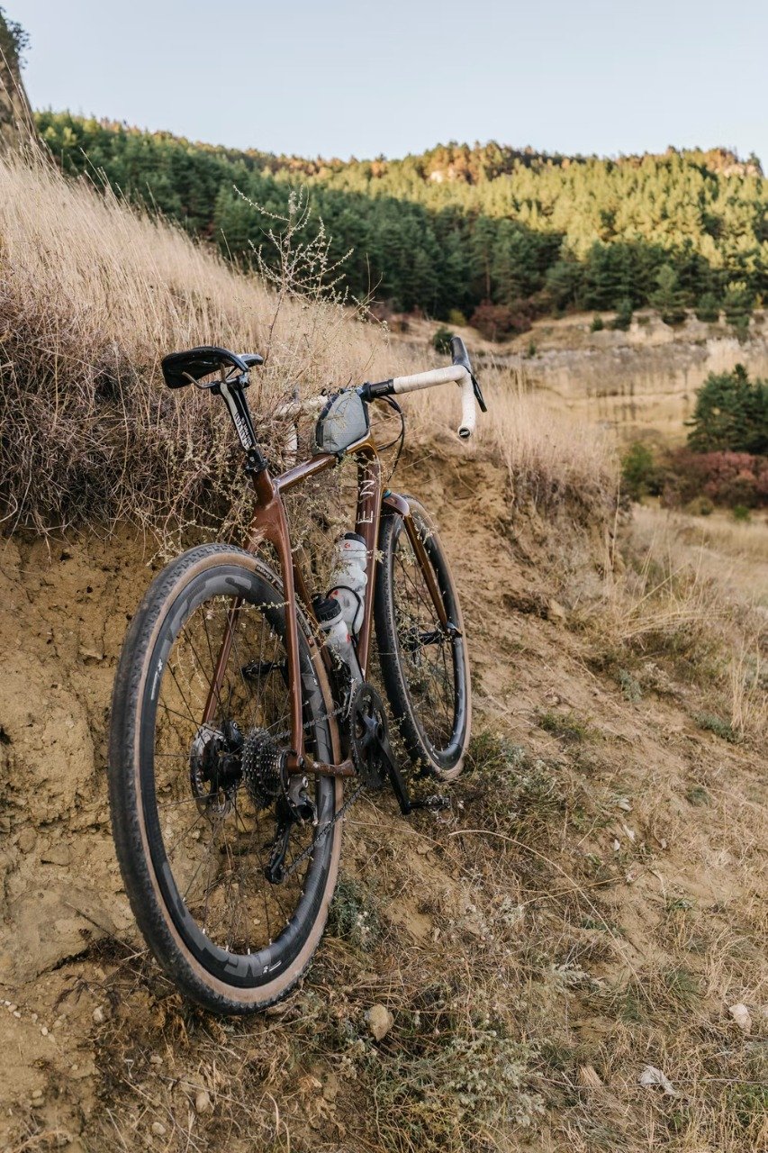 A bicycle parked on a hillside 