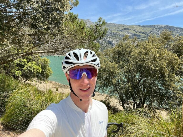 A selfie of a cyclist on the road to Puig Major with Gorgeous Blau in the background