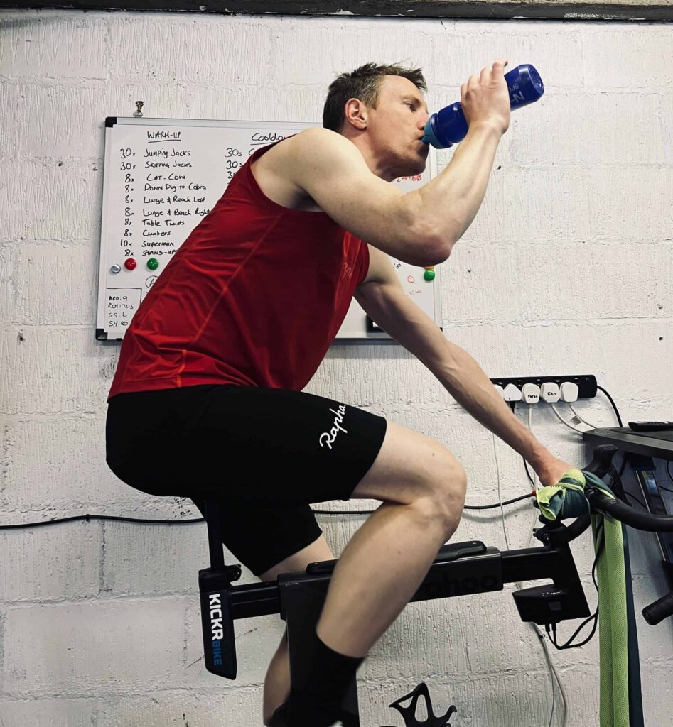 cyclist drinking water