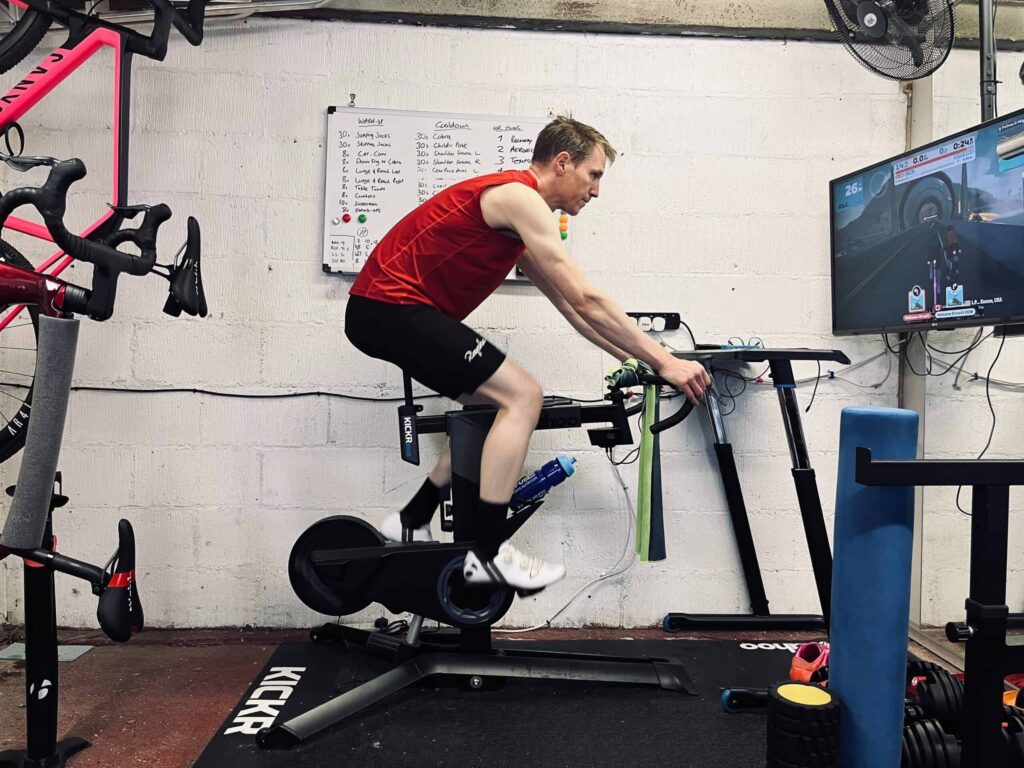 A man having an exercise using an indoor bike