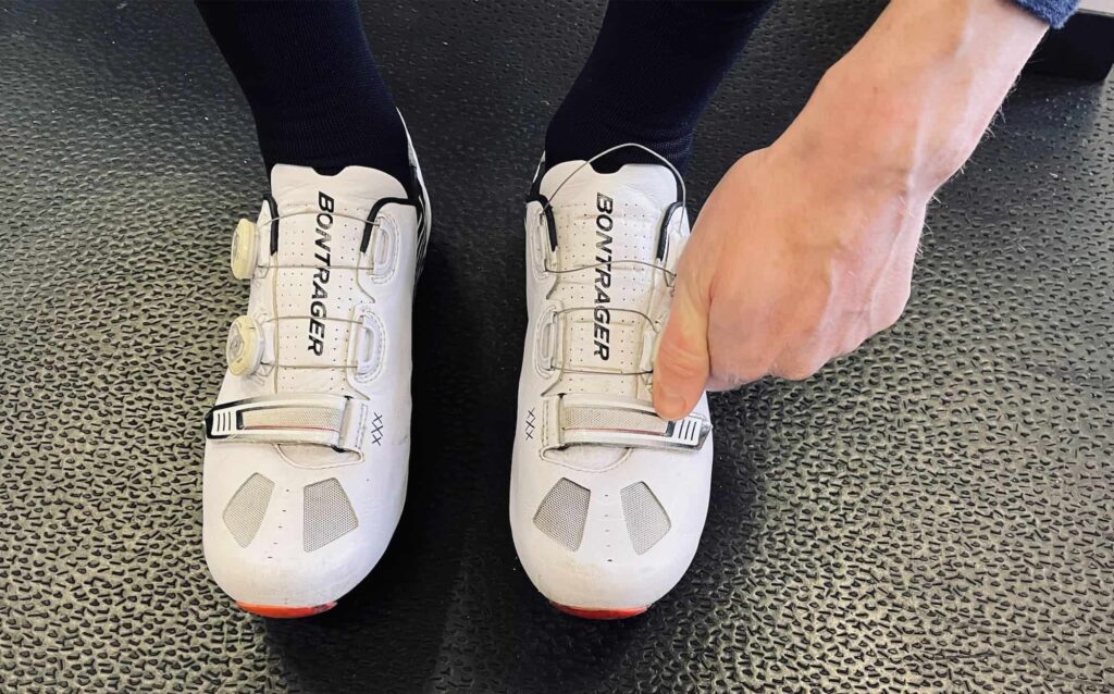 cyclist getting ready – wearing cycling shoes