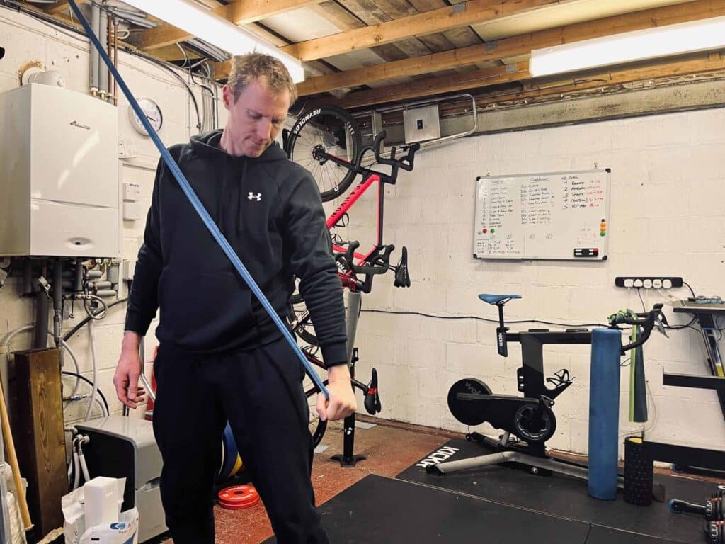 cyclist stretching his arms