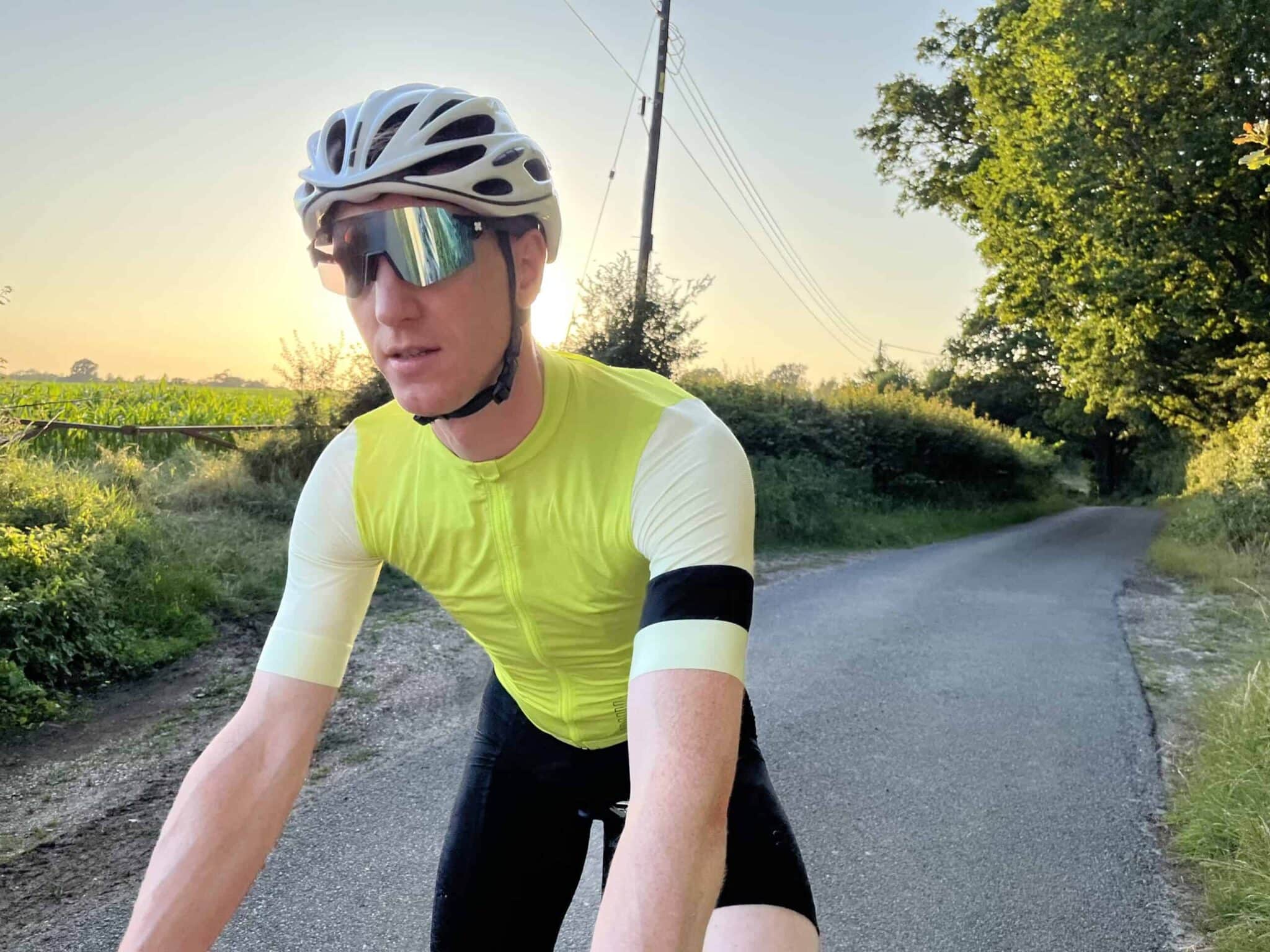 closed up shot of cyclist wearing yellow green