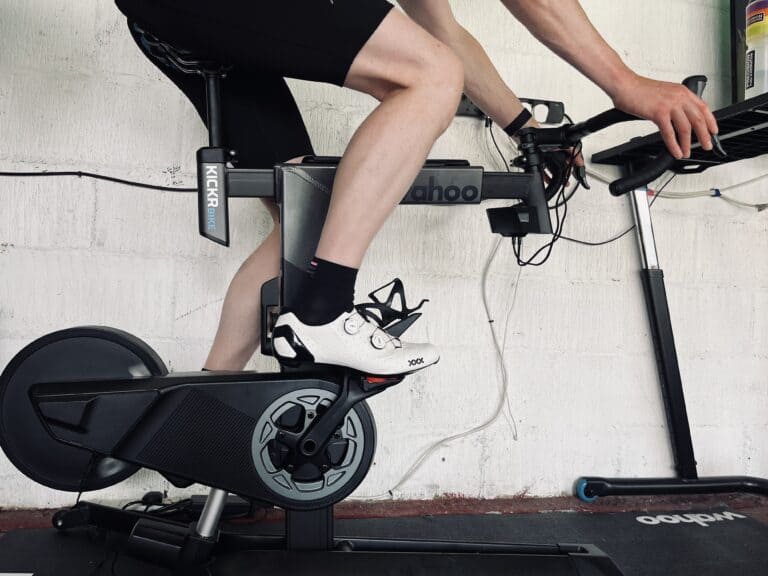 close up legs of cyclist on indoor turbo