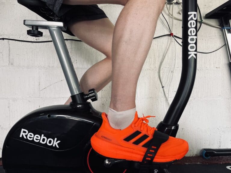 closed up shot of cyclist on an indoor bike