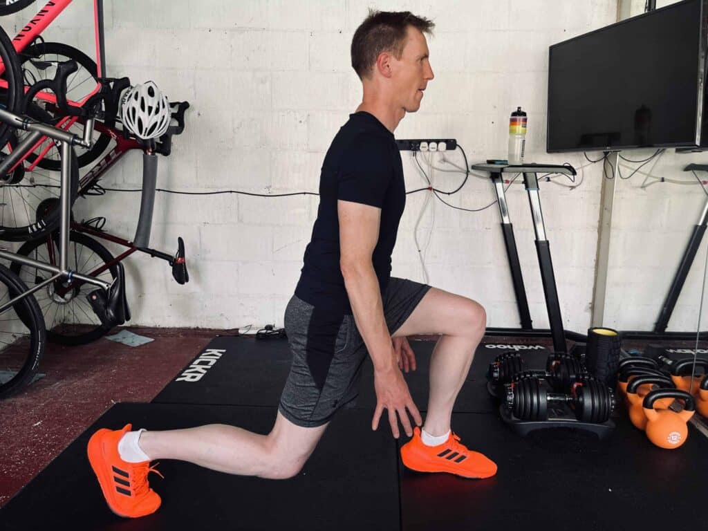 a cyclist doing bodyweight exercises for cyclists to improve his performance