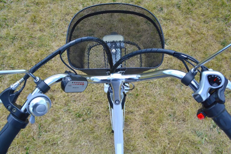 Electric bicycle rudder or helm in the park on sunny summer day.