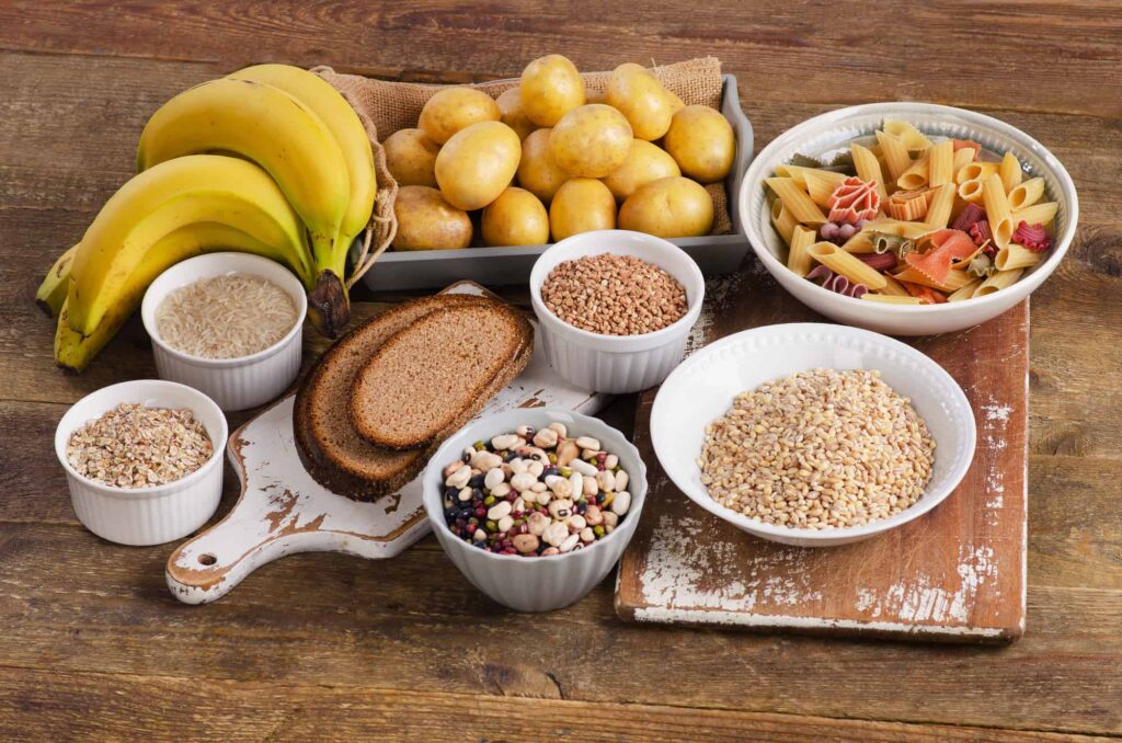 A variety of foods on a wooden table.